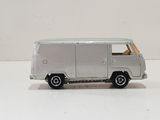 a toy van that is sitting on a white surface