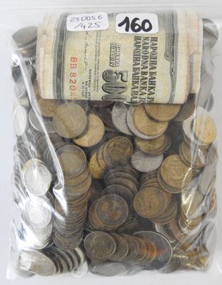 a bag full of coins sitting on a table