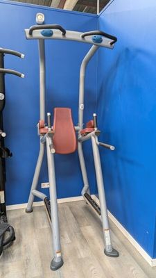 an image of a gym equipment set up against a blue wall