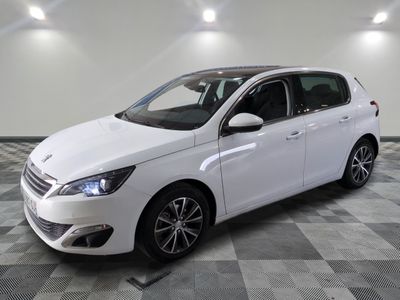 the white car is parked on a checkered tile floor