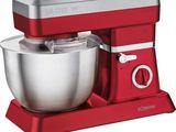 the red and silver mixer is on a stand with a metal bowl