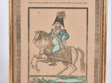 an old picture of a man riding a horse with a hat on