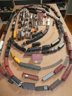a lot of toy train tracks on a table