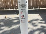 a close up of a parking meter on the street