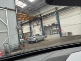 a car that is parked inside of a building