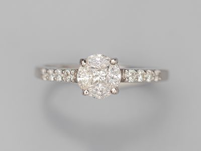 a diamond ring with a single stone in the center