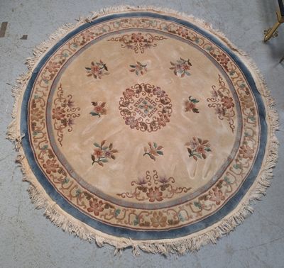 a round rug on the floor in a room