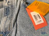 a tag on the back of a pair of jeans
