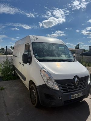 a white van that is parked in a parking lot