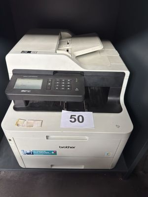 a printer that is sitting on top of a desk
