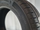 a close up of a tire on a white surface