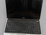 a laptop computer that is sitting on a table