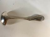 a spoon that is sitting on a table