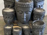 a lot of pots that are sitting on a table