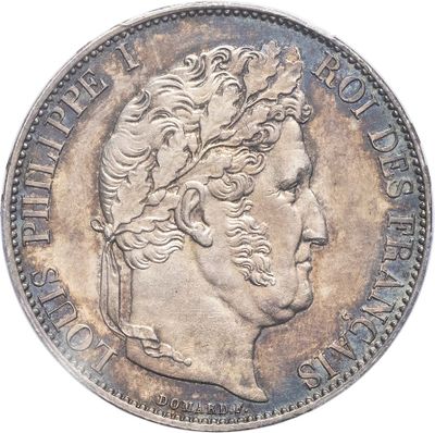 a close up of a coin on a white background