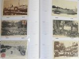 an open book with a bunch of old photos on it