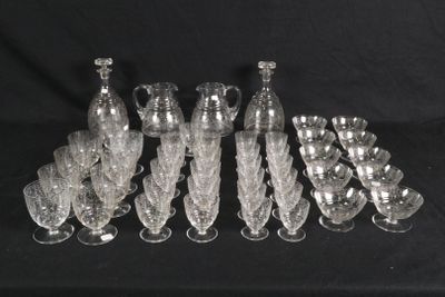 a lot of glass vases that are sitting on a table
