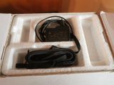 a box that has a charger and a cord in it