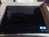 a box that has a stove top inside of it