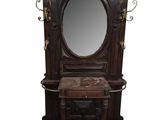 a mirror on a stand with a mirror above it