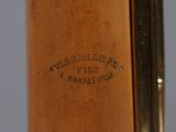 a close up of a baseball bat with the name of the player