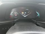 the dashboard of a car with a digital display on it