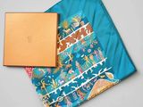 a close up of a box with a cloth and a box on it