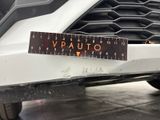 a close up of a ruler on the front of a car