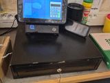 a laptop computer sitting on top of a desk