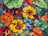 une peinture à l'huile représentant des fleurs colorées dans un vase posé sur une table