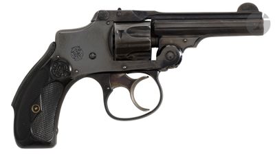a close up of a revolver on a white background