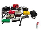 many different types of cameras on a white surface
