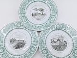 three green and white plates with a picture of a farm in the center