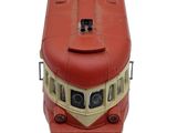a red and white train on the tracks on a white background