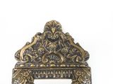 a mirror that has a picture of a lion on it