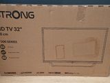a box with a picture of a tv on it on a table