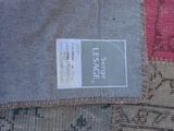 an image of a piece of fabric with a label on it