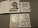 a lot of stamps on the pages of a book