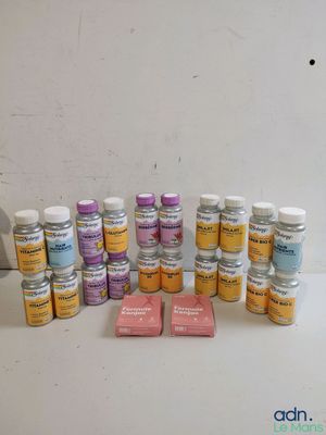 a white table topped with lots of different types of paint