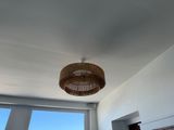 a light that is hanging from the ceiling in a room