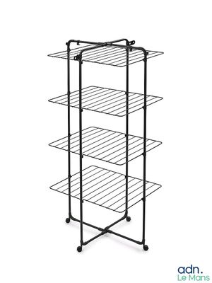 a close up of a rack with four shelves on top of it