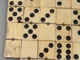 a lot of dominos that are on the table