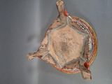 a turtle shaped bowl on a table with a spoon in it