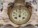 a clock that is sitting on top of a table