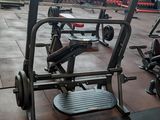 a gym with a lot of equipment in the room