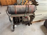 an image of a machine that is sitting in a garage