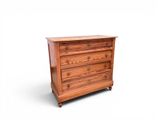 an image of a wooden chest of drawers against a white background