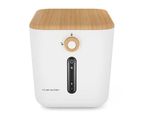 un gros plan d'un humidificateur sur fond blanc
