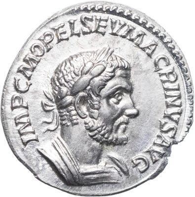 une pièce d'argent portant l'image d'un homme