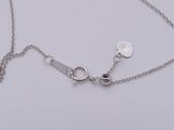 silver plated necklace with a heart and a key on a chain